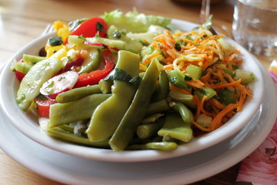 Close-up of chopped vegetables in bowl on table
