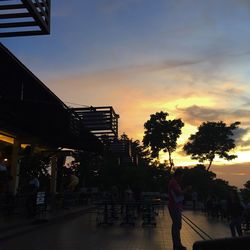 Silhouette of building at sunset