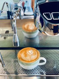 Close-up of cappuccino on table