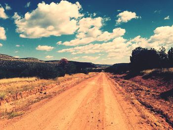 Country road passing through landscape