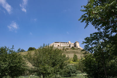 Low angle view of fort against sky