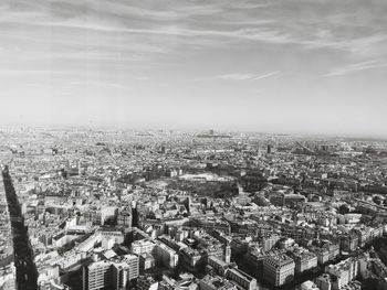 Aerial view of cityscape against sky