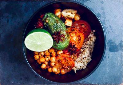 High angle view of fruits in plate on table