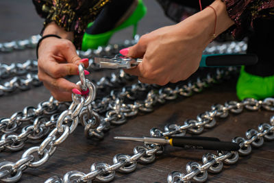 Midsection of woman working on table