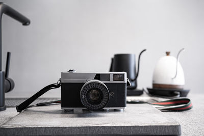 Close-up of camera on table