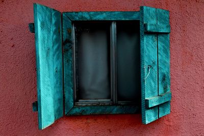 Close-up of closed window of building