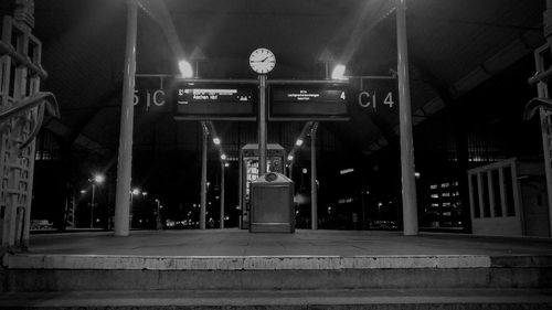 Illuminated information sign at night