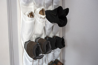 Shoes hanging on wall