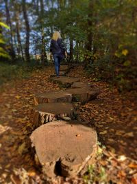 Full length of boy walking in water