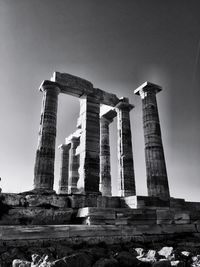 Low angle view of old structure against sky