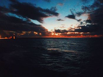 Scenic view of sea against cloudy sky