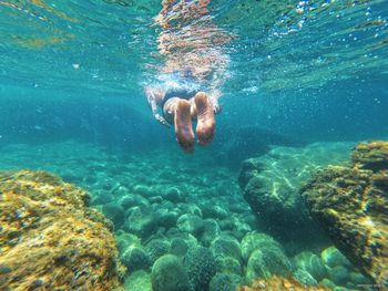 Person swimming in sea