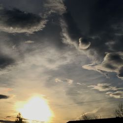 Low angle view of dramatic sky during sunset