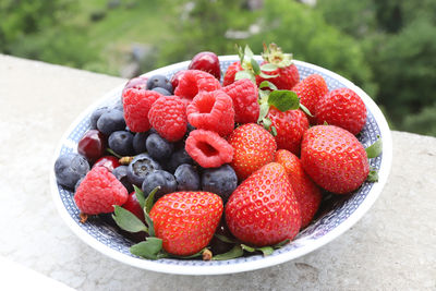 Close-up of strawberries in bowl on table