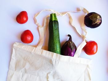 Close-up of tomatoes against white background