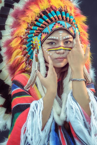 Portrait of young woman wearing mask