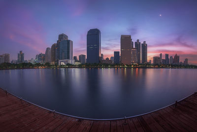 City at waterfront against sky