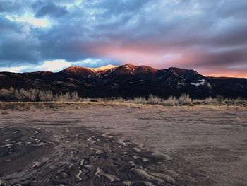 Scenic view of landscape against sky during sunset