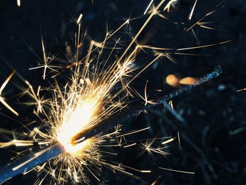 Close-up of firework display at night