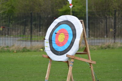 Close-up of umbrella on field