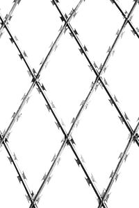 Low angle view of barbed wire against clear sky