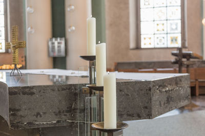 Close-up of faucet against wall at home