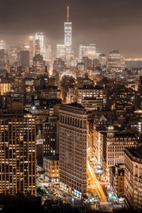 Aerial view of illuminated city at night