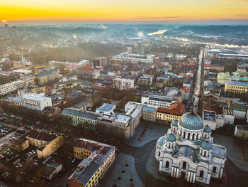 Aerial view of cityscape during sunrise