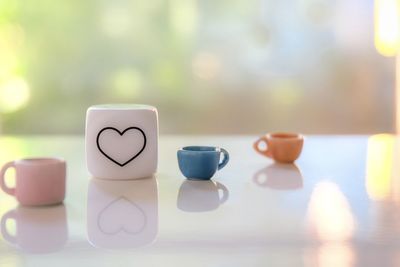 Close-up of coffee cup on table