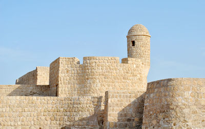 Low angle view of historic building against sky