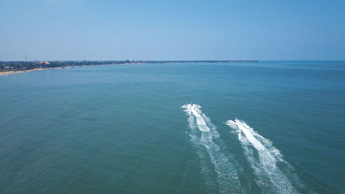 Scenic view of sea against clear sky