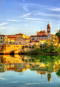 Reflection of buildings in lake