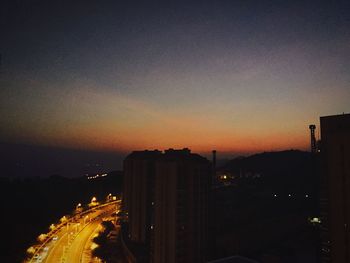 Illuminated cityscape at night