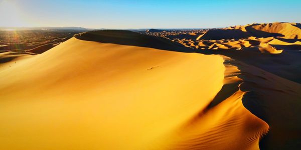 Scenic view of sahara desert against sky at merzouga