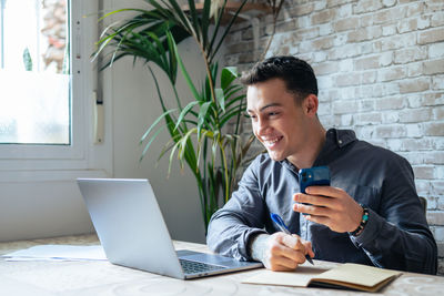 Young man working at office