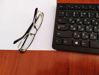 High angle view of computer keyboard on table