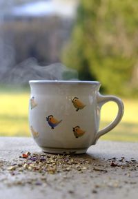 Close-up of tea cup on table