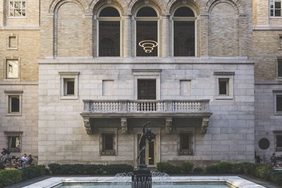 Vintage look of a sculpture on the courtyard of the mckim building of boston public library