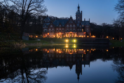 Reflection of illuminated built structures in water