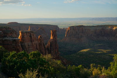 Scenic view of rock formations against sky