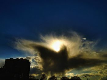 Low angle view of cloudy sky at sunset