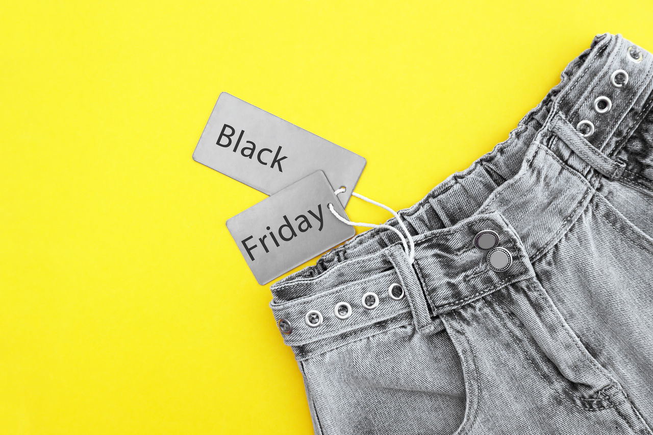 yellow, finance, currency, business, paper currency, wealth, clothing, studio shot, footwear, indoors, colored background, no people, close-up, business finance and industry, jeans, finance and economy