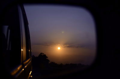 Sunset seen through car window