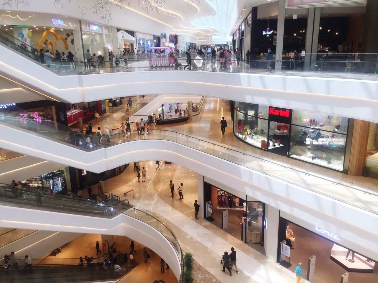 large group of people, architecture, real people, high angle view, built structure, city, leisure activity, tourism, indoors, women, city life, illuminated, modern, lifestyles, men, day, people, adult