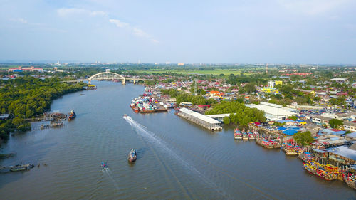 High angle view of river amidst buildings in city