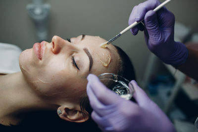 Close-up of woman having beauty treatment at spa