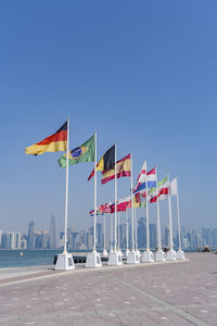 Flags of nations qualified for world cup qatar 2022 hoisted at doha corniche, qatar.