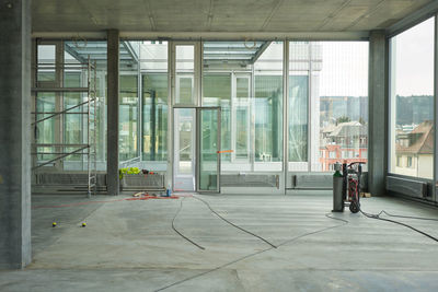Man working on glass window