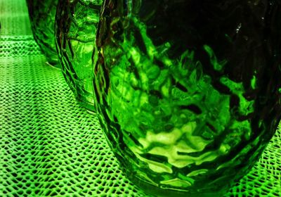 Close-up of green leaf on table