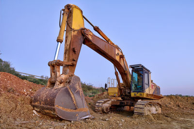 Construction site on field against clear sky